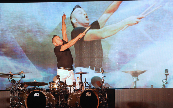 Newsboys drummer ,Duncan Phillips, dances while they perform at the Canfield Fair on Sunday night.  Dustin Livesay  |  The Vindicator  9/4/16  Canfield Fair