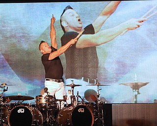 Newsboys drummer ,Duncan Phillips, dances while they perform at the Canfield Fair on Sunday night.  Dustin Livesay  |  The Vindicator  9/4/16  Canfield Fair