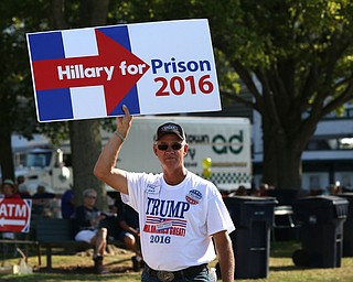 Nikos Frazier | The Vindicator..Mike Young of Berlin Center, walks towards the Mahoning County Democratic Party Tent at the Canfield Fair on Monday, Sept. 5, 2016.