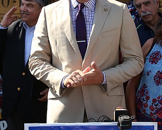 Nikos Frazier | The Vindicator..Rep. Tim Ryan speaks at a press conference outside the Mahoning County Democratic Party Tent at the Canfield Fair on Monday, Sept. 5, 2016.