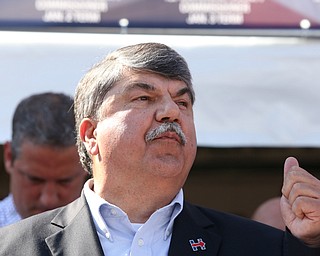 Nikos Frazier | The Vindicator..Richard Trumka, AFL-CIO President, speak at a press conference outside the Mahoning County Democratic Party Tent at the Canfield Fair on Monday, Sept. 5, 2016.