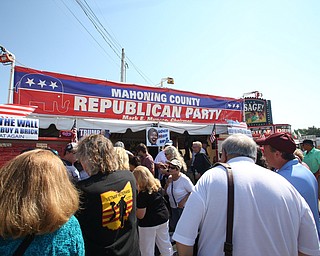Canfield, Ohio | September 5, 2016: ..Fairgoers wait outside the Mahoning Country Republican Party tent hours before Republican Presidential Candidate, Donald J. Trump arrived at the Canfield Fair on Monday, Sept. 5, 2016 in Canfield, Ohio...Nikos Frazier | The Vindicator.
