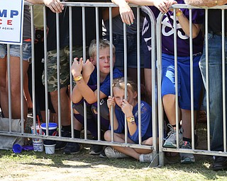Canfield, Ohio | September 5, 2016: ..Two young supporters wait in the shade of a growing crowd before Donald J. Trump to arrive at the Canfield Fair on Monday, Sept. 5, 2016 in Canfield, Ohio...Nikos Frazier | The Vindicator.