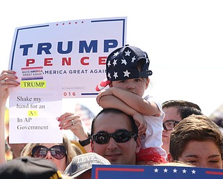 Canfield, Ohio | September 5, 2016: ..A young girl waits patiently for Donald J. Trump to arrive at the Canfield Fair on Monday, Sept. 5, 2016 in Canfield, Ohio...Nikos Frazier | The Vindicator.