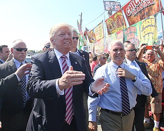 Canfield, Ohio | September 5, 2016: ..Republican presidential candidate Donald Trump and Indiana Gov. Mike Pence greet supporters during a stop to the 170th Canfield Fair on Monday, Sept. 5, 2016 in Canfield, Ohio...Nikos Frazier | The Vindicator.