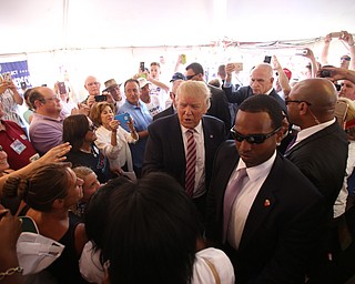Canfield, Ohio | September 5, 2016: ..Republican presidential candidate Donald Trump greets supporters inside the Mahoning Country Republican Party tent during a stop to the 170th Canfield Fair on Monday, Sept. 5, 2016 in Canfield, Ohio...Nikos Frazier | The Vindicator.