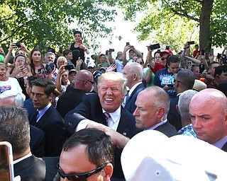 Canfield, Ohio | September 5, 2016: ..Republican presidential candidate Donald Trump shakes hands with a supporter while leaving the 170th Canfield Fair on Monday, Sept. 5, 2016 in Canfield, Ohio...Nikos Frazier | The Vindicator.