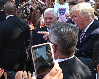 Canfield, Ohio | September 5, 2016: ..Republican presidential candidate Donald Trump and Indiana Gov. Mike Pence greet supporters while leaving the 170th Canfield Fair on Monday, Sept. 5, 2016 in Canfield, Ohio...Nikos Frazier | The Vindicator.