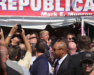 .          ROBERT  K. YOSAY | THE VINDICATOR..The Donald speaks briefly to crwod as he exittied...Donald Trump... visitedthe Canfield Fair on Monday afternoon..-30-