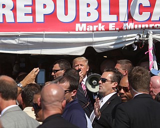  .          ROBERT  K. YOSAY | THE VINDICATOR..The Donald speaks briefly to crwod as he exittied...Donald Trump... visitedthe Canfield Fair on Monday afternoon..-30-