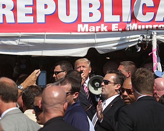  .          ROBERT  K. YOSAY | THE VINDICATOR..The Donald speaks briefly to crwod as he exittied...Donald Trump... visitedthe Canfield Fair on Monday afternoon..-30-