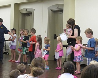 Neighbors | Alexis Bartolomucci.The children who attended story time at the Boardman library on Aug. 15 stood in a line, each holding up an animal from the book "Brown Bear."