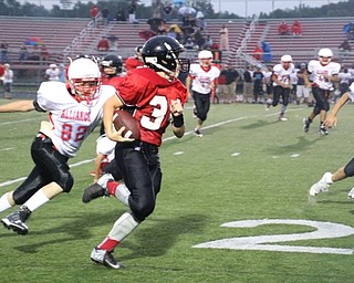 Neighbors | Submitted.Toby Smith (34) raced 30 yards for the touchdown against Alliance on Aug. 31. The Canfield Village Middle School seventh-grade team defeated its opponents with a score of 36-0.