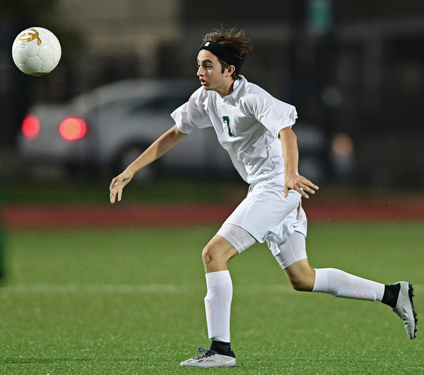 YOUNGSTOWN, OHIO - SEPTEMBER 8, 2016: Nick Beike #7 of Ursuline runs after the bouncing ball during the second half of their game Thursday night at Youngstown State University. DAVID DERMER | THE VINDICATOR