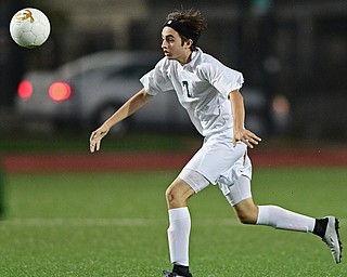 YOUNGSTOWN, OHIO - SEPTEMBER 8, 2016: Nick Beike #7 of Ursuline runs after the bouncing ball during the second half of their game Thursday night at Youngstown State University. DAVID DERMER | THE VINDICATOR