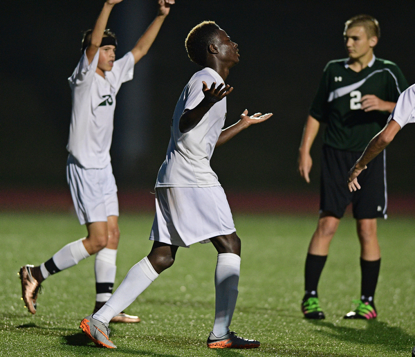 YOUNGSTOWN, OHIO - SEPTEMBER 8, 2016: Guy Kaho#11 of Ursuline celebrates after scoring a goal during the second half of their game Thursday night at Youngstown State University. DAVID DERMER | THE VINDICATOR..Jacob Coman #20 of Ursuline and Zach Dean #2 of West Branch pictured.