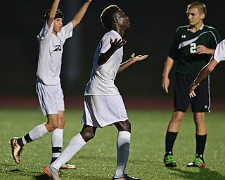 YOUNGSTOWN, OHIO - SEPTEMBER 8, 2016: Guy Kaho#11 of Ursuline celebrates after scoring a goal during the second half of their game Thursday night at Youngstown State University. DAVID DERMER | THE VINDICATOR..Jacob Coman #20 of Ursuline and Zach Dean #2 of West Branch pictured.