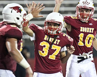 William D Lewis The Vindicator Mooney kicker Lizzie Philibin (37) gets conrats from Vinny Santisi(55) and Pat Pelini(10) after scoring her first extra point in a Sept. 9, 2016 game against Akron North in Youngstown.is the school's first female football player.