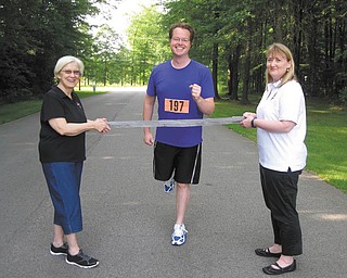 SPECIAL TO THE VINDICATOR
The Ursuline Sisters HIV/AIDS Ministry will host its second annual Nun Run on Oct. 8 at the Ursuline Center, 4280 Shields Road, Canfield. Preparing for the event from Ursuline Sisters HIV/AIDS Ministry, are Sister Kathleen Minchin, left, co-executive director; Daniel Wakefield, associate director; and Brigid Kennedy, co-executive director. Registration is $20 before Oct. 7 and $25 the day of the race. Registration will open at 7:30 a.m. There will be a Kids Fun Run at 8:15 a.m. followed by the one mile walk at 8:30 and the 5K Race at 9. There will be awards given to the top three male and female finishers and age group winners. Proceeds will benefit the children’s program of the Ursuline Sisters HIV/AIDS Ministry. For information about the event, call Wakefield at 330-770-3061 or email dwakefield@ursulinesistersaids.org.
