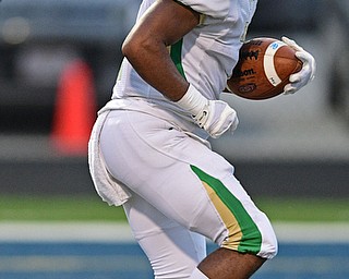 AKRON, OHIO - SEPTEMBER 9, 2016: Daylen Harris #1 of Ursline runs into the end zone to score on a 4th and 1 from the one yard line during the first half of their game Friday night at Hoban High School. DAVID DERMER | THE VINDICATOR
