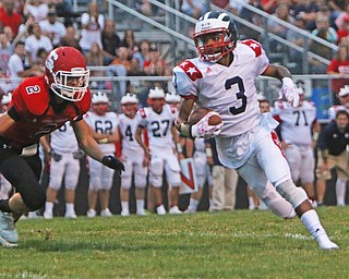 Jasson Faison (3) of Niles outruns Nick Adams (2) of Struthers to the endzone during the second quarter of Friday nights matchup at Struthers High School.  Dustin Livesay  |  The Vindicator  9/9/16  Struthers.