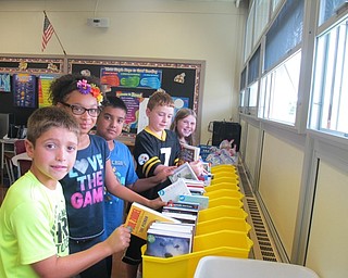 Neighbors | Alexis Bartolomucci.The fourth-grade students in Jan Zorman's class at Robinwood Lane Elementary picked out books for the new reading program they are participating in this year.