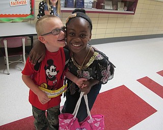 Neighbors | Alexis Bartolomucci.Rylan and his fourth-grade bus buddy, Nautica, got ready to go to the bus after the first week of school at Robinwood Lane Elementary came to an end on Sept. 1.