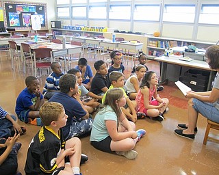 Neighbors | Alexis Bartolomucci.Jan Zorman read to her class of fourth-graders at Robinwood Lane Elementary on the last day of the first week of school on Sept. 1.