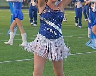 Poland senior majorette, Rachel Stahl, twirls during the Poland alma mater before the start of Friday nigths matchup against Howland at Poland High School.   Dustin Livesay  |  The Vindicator  9/16/16  Poland Seminary High School.