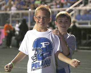 (L-R) Georgie Camuso (7) and Matthew Campbell (7) cheer for the Poland Bulldogs on the sidelines during the Bulldogs matchup against Howland on Friday night.  Dustin Livesay  |  The Vindicator  9/16/16  Poland.