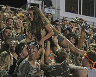 Howland High School freshman Lexi Readman gets thrown in the air by her classmates during the second quarter of Friday nights matchup after the Tigers return a blocked punt for a touchdown at Poland High School.   Dustin Livesay  |  The Vindicator  9/16/16  Poland Seminary High School.