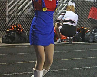 Poland majorette, Emma Bodendorfer, wears a Mario costume while performing at halftime of the Poland vs Howland football game on Friday night.  Dustin Livesay  |  The Vindicator  9/16/16  Poland Seminary High School.