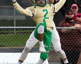 MICHAEL G TAYLOR | THE VINDICATOR- 9-17-16- 1st qtr., Ursuline's #2 Anise Algahmee is able to prevent a TD catch by Massillon's #7 Austin Jasinski. Massillon-Washington Tigers vs Youngstown Ursuline Irish at Mollenkopf Stadium in Warren, OH.