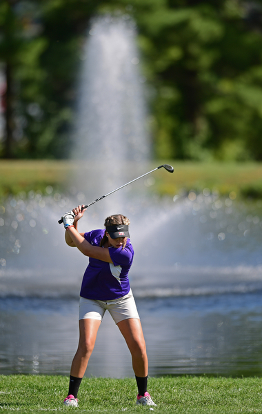 POLAND, OHIO - SEPTEMBER 19, 2016: Allison Smith of Champion comes down on her backswing from the drop zone, after having to take a drop, on the 6th hole Monday afternoon at The Lake Club during the Christine Terlesky Benefit Golf Tournament. DAVID DERMER | THE VINDICATOR