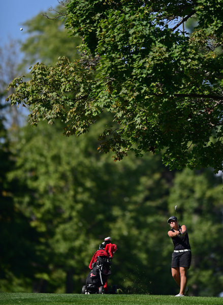 POLAND, OHIO - SEPTEMBER 19, 2016: Gillian Cerimele of Canfield follows through on her approach shot on the 15th hole hole Monday afternoon at The Lake Club during the Christine Terlesky Benefit Golf Tournament. DAVID DERMER | THE VINDICATOR