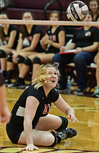 BOARDMAN, OHIO - SEPTEMBER 20, 2016: Madison Johns #25 of Canfield watches as the volleyball falls toward the ground during the third set of their match Tuesday night at Boardman High School. DAVID DERMER | THE VINDICATOR