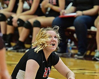 BOARDMAN, OHIO - SEPTEMBER 20, 2016: Madison Johns #25 of Canfield watches as the volleyball falls toward the ground during the third set of their match Tuesday night at Boardman High School. DAVID DERMER | THE VINDICATOR