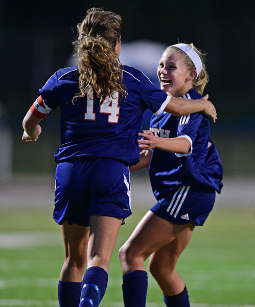 HUBBARD, OHIO - SEPTEMBER 21, 2016: Katyln Klasic #7 of Fitch celebrates with teammate Kelsey Gartland #14 after scoring a first half goal during their game Wednesday night at Hubbard Memorial Stadium. DAVID DERMER | THE VINDICATOR