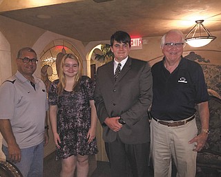 SPECIAL TO THE VINDICATOR
Members of the Penn State Alumni Chapter of Greater Youngstown awarded the Allen Udell Memorial Scholarship to three local high school graduates who are attending Penn State University. Chapter President Gerry Ricciutti, left, and Chapter Vice President Tom Pauley, right, awarded the scholarships to Megan Wilt of Boardman and Nicholas Finch of New Waterford. Paige Johnson of Salem is the third recipient, totaling $2,000 between the three students. The chapter raises money for scholarships from Mahoning, Trumbull and Columbiana counties by selling raffle tickets. The program has raised more than $20,000 since it was established.
