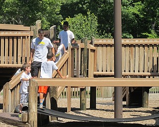 Neighbors | Alexis Bartolomucci.The children in Camp FRIEND spent their last day of camp on Aug. 26 at Boardman Park playing on the equipment after a picnic.