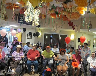 Neighbors | Alexis Bartolomucci.The residents at Beeghly Oaks gathered together as they finished the second day of their puzzle contest on Aug. 23.