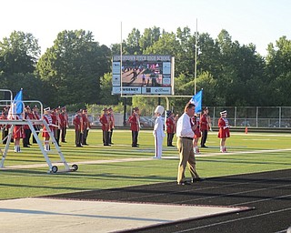 Neighbors | Alexis Bartolomucci.Austintown Fitch High School Principal Chris Berni spoke to the audience on Aug. 29 at the Fitch Band Night before the Fitch band performed at Greenwood Falcon Stadium.
