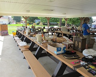 Neighbors | Alexis Bartolomucci.Many different items available for purchase were set out on tables at the Trash and Treasure sale on Sept. 10 hosted by the Poland Junior Women's Club.
