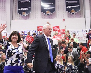 William D Lewis The Vindicator Gov. Mike Pence and his wife Karen enter rally in Leetonia 9-28-16.