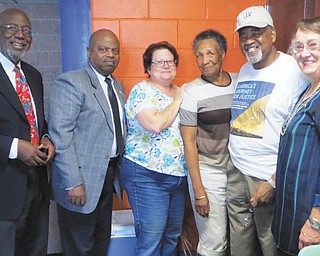 SPECIAL TO THE VINDICATOR
Altrusa International of Youngstown and NAACP Youngstown Branch sponsored a back-to-school event Aug. 19 at the Boys and Girls Club. Books and 120 bags of school supplies were distributed to children and teens and a lunch was served. Some of those participating in the event, from left, are Jimma McWilson and Wali Salahuddin, NAACP; Janet Haladay, Altrusa; Cossell Burton, NAACP; George Freeman, president of NAACP; and Sharmon Lesnak, president of Altrusa.