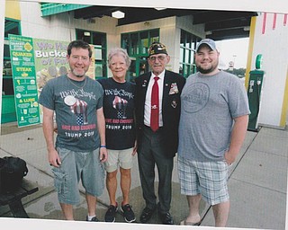 SPECIAL TO THE VINDICATOR
Ken Calhoun, commander of the All-American VFW Meander Post 9571, was one of 11 veterans honored at the Sept. 9 Patriot Day celebration at Quaker Steak & Lube, Austintown. Calhoun served in the U.S. Marine Corps, Army and Air Force. He retired after serving for 28 years and in three wars, Vietnam, Persian Gulf and the War on Terror. Calhoun is pictured with his family after the ceremony, including his son Tom, left, his wife Donna, and his son Trevor.
