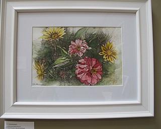 Neighbors | Alexis Bartolomucci.Lilian Filippou's created her paintings with inspiration from the flowers at Fellows Riverside Gardens. Several of her paintings will be on display at the Weller Gallery through the end of November.