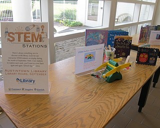 Neighbors | Alexis Bartolomucci.The Austintown library set up a STEM statition with two different activities for children to explore during the month of September.