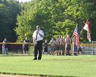 Neighbors | Alexis Bartolomucci.Fire Chief Mark Pitzer spoke before the Battle of the Badges baseball game at the Boardman Field of Dreams started on Sept. 12.