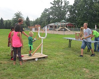 Neighbors | Alexis Bartolomucci.Children lined up to play a slingshot game at the Poland United Methodist Church Family Funday Carnival on Sept. 17.